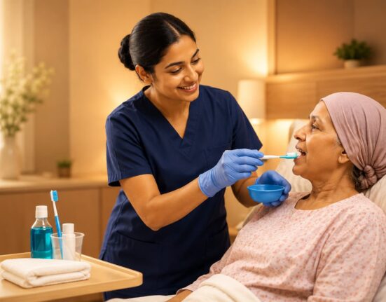 Nurse practicing Oral Care in Cancer Treatment Scenerio