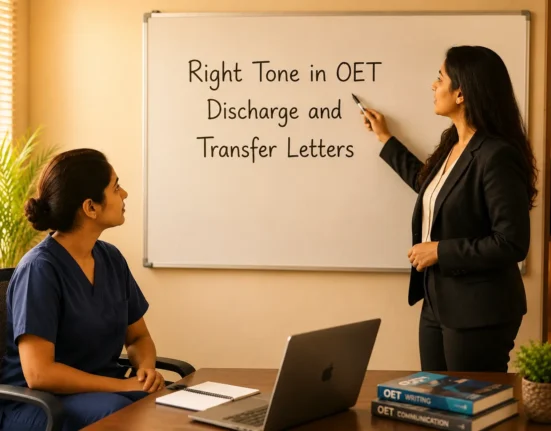 OET mentor pointing at a whiteboard while a nurse in navy blue scrubs learns the right tone for discharge and transfer letters.